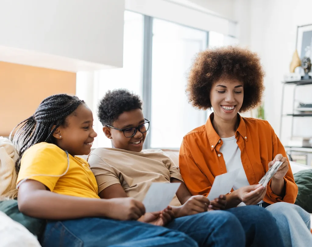 smiling mom telling her kids about her pregnancy