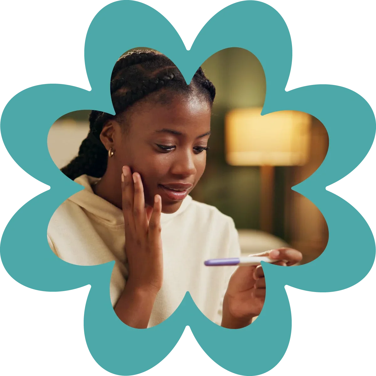 woman holding pregnancy test not sure what to think