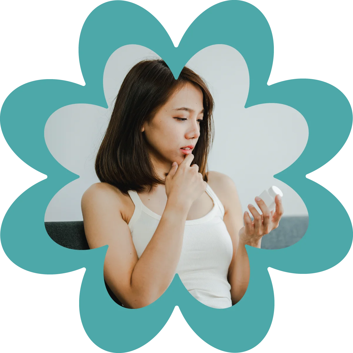 woman reviewing label on abortion pills